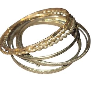 Bundle of 10 gold plated slip-on bangle bracelets